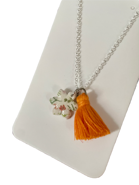 Collier flocon à pompon