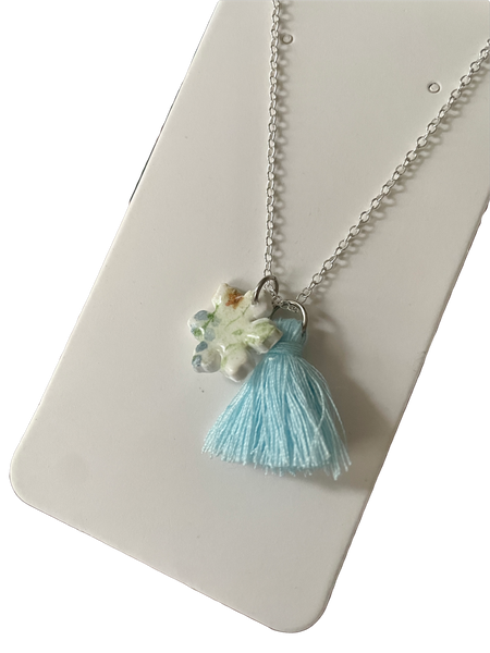 Collier flocon à pompon