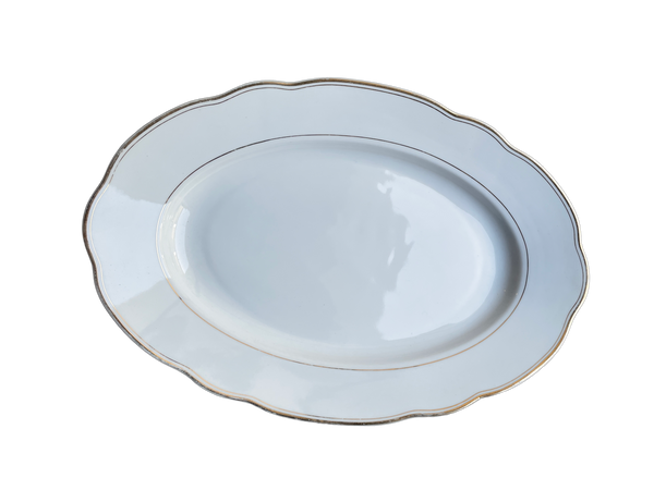 Plat ovale dentelé